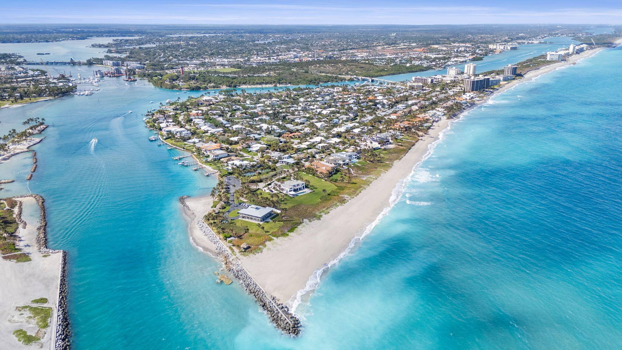 Just steps from the private, secured beaches of Jupiter Inlet Colony, this one level Mid Century coastal retreat sits on a prime interior lot, offering both charm and opportunity.