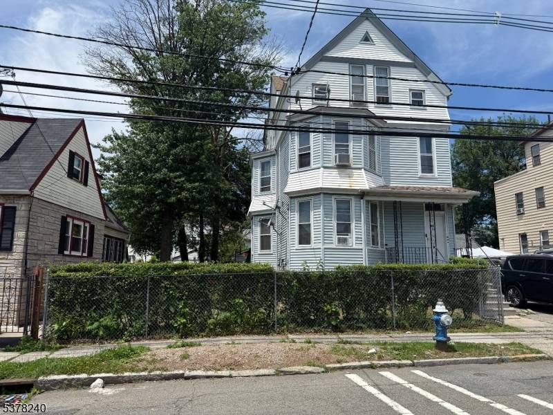 Investor's Dream ! Spacious 3 Family situated directly across from the newly renovated Irvington Park !