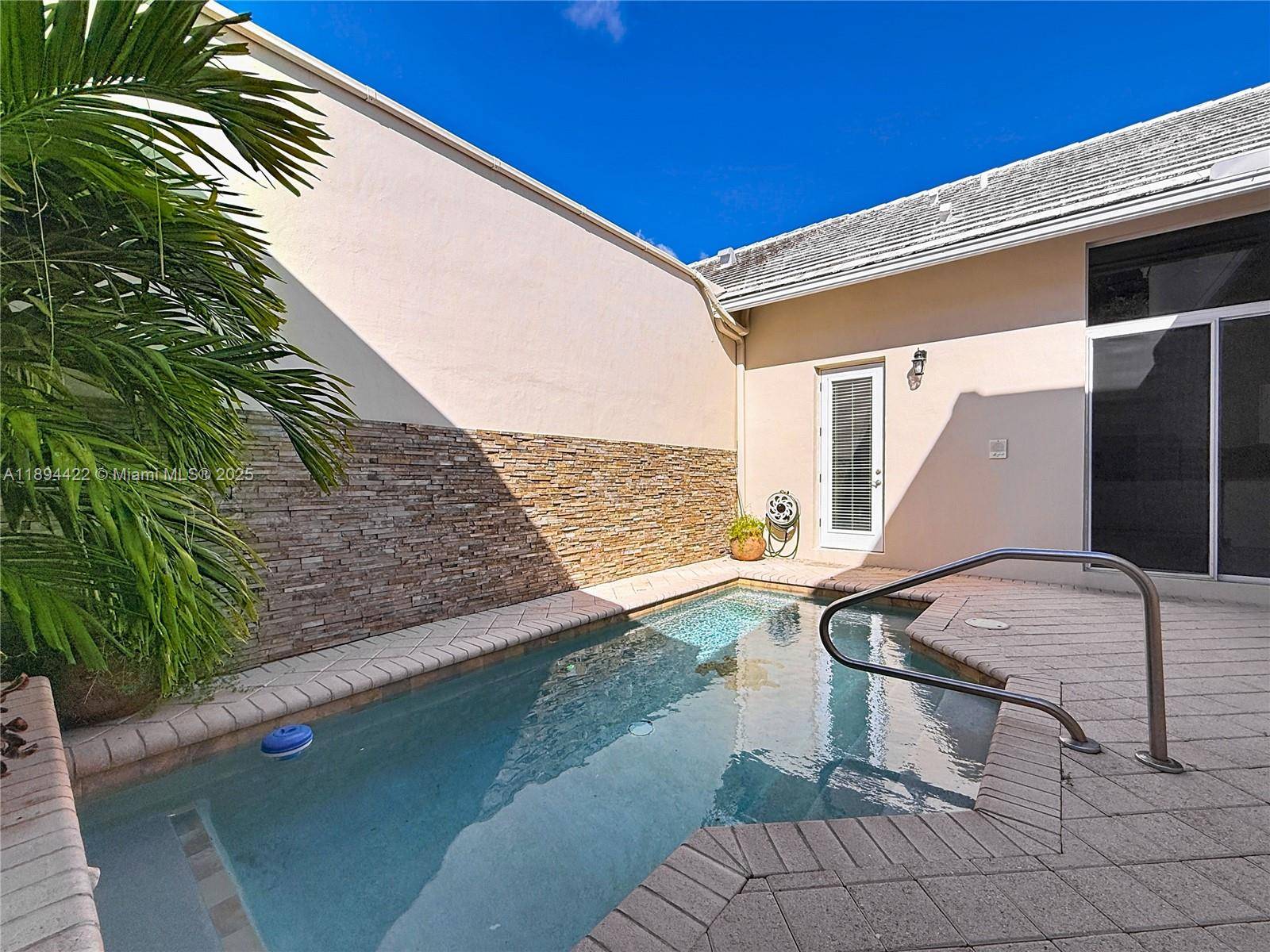 Charming and the largest available courtyard townhome with a private pool in the exclusive Boca Golf amp ; Tennis Club !