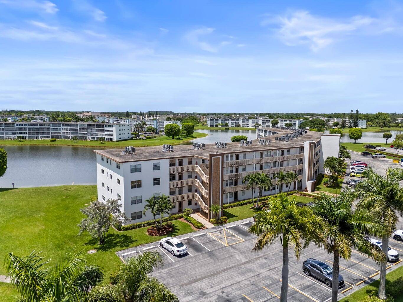 2 1. 5, Desirable 4th floor, no one is above you, updated kitchen with stainless appliances, quartz and recessed lighting, wood look floor, updated bathrooms, shower no tub, screened patio ...