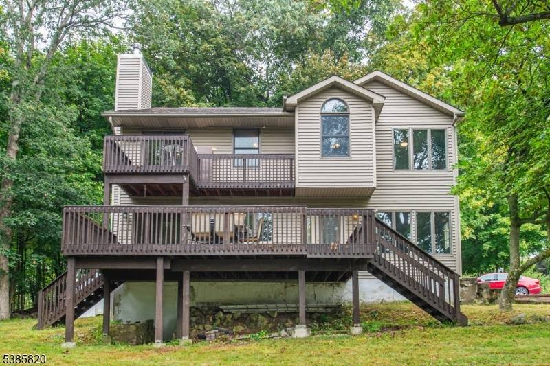 Expanded Custom Colonial Offers Exceptional Seasonal Lake Views Of Desirable Lake Hopatcong !