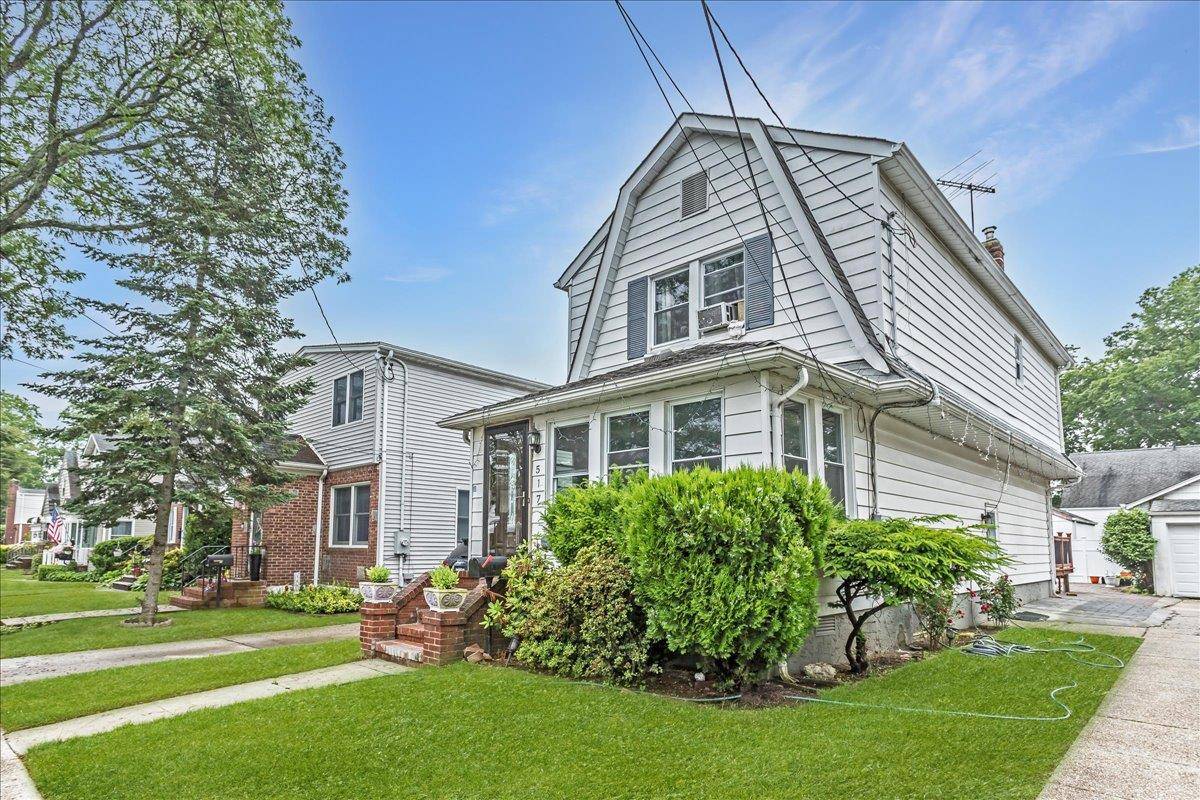 Well maintained colonial home in the heart of New Hyde Park village.
