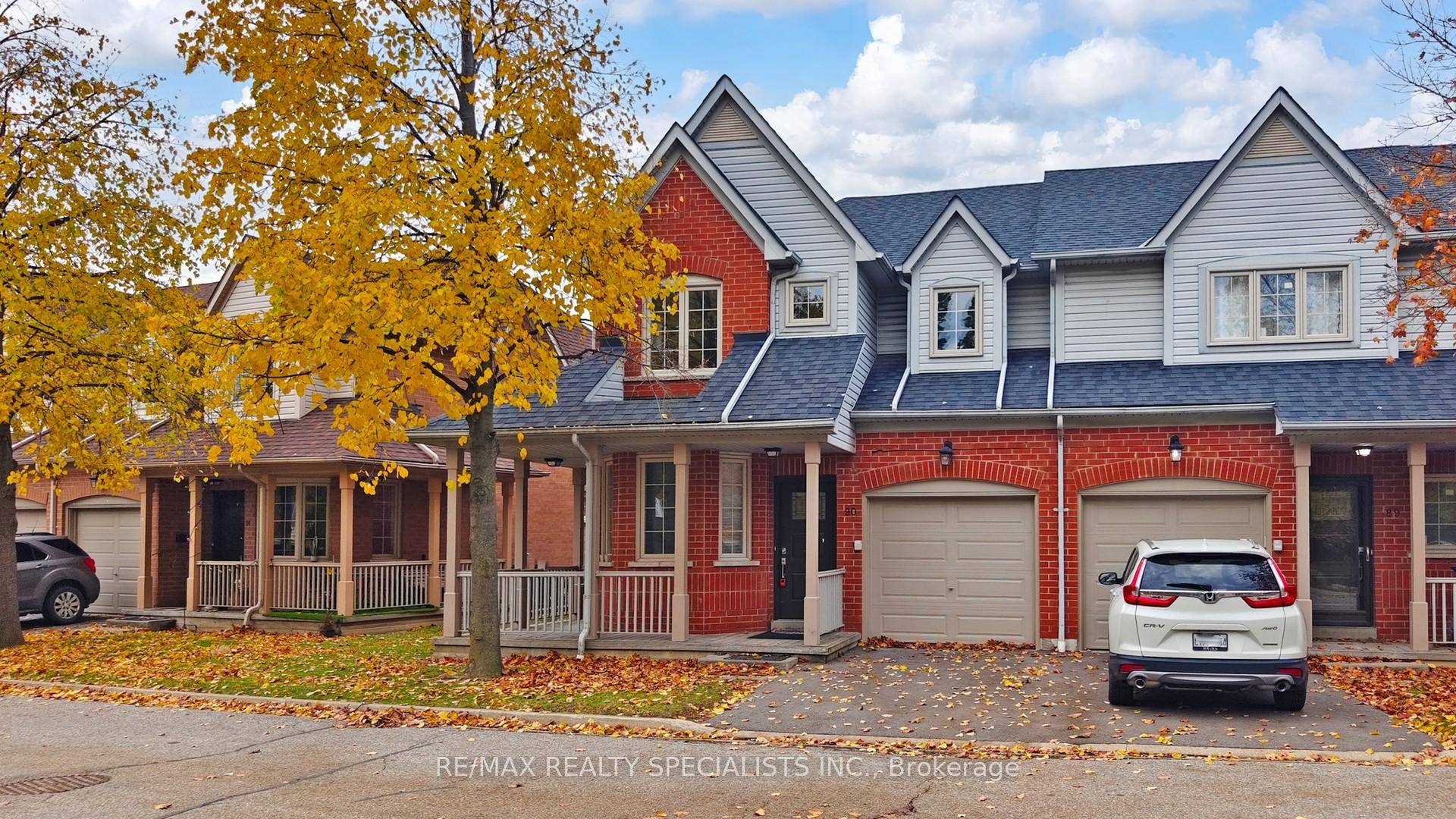 End Unit Perfection Fully Renovated Townhome with Unbeatable Curb Appeal !