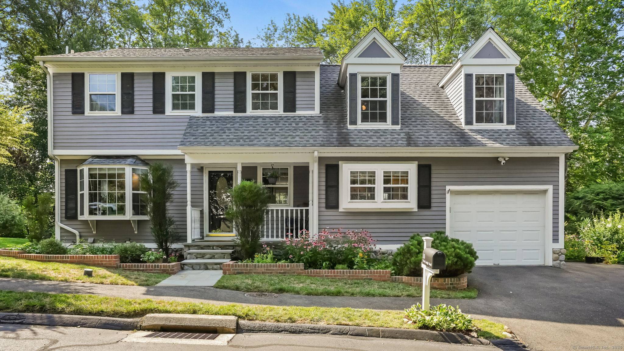 Enjoy the privacy of a single family home with the ease of HOA living at 10 Twin Ledge Rd 10.