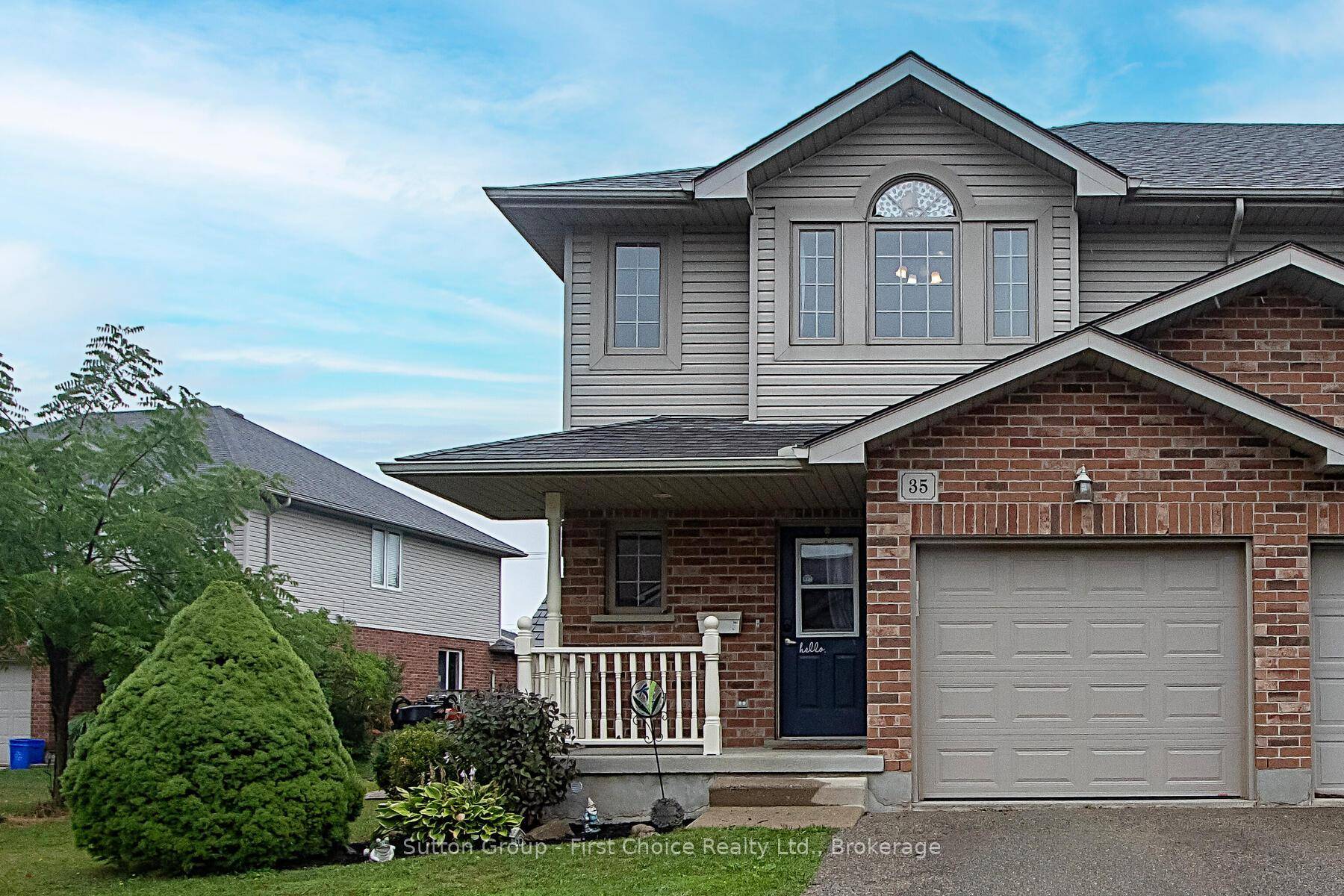 Charming end unit townhouse with huge pie shaped yard !