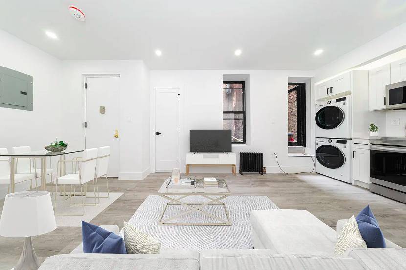 Be the first to live in this newly renovated 1 bedroom 1 bath apartment that is complete with wide grain, matte finish hardwood floors, in unit washer dryer, and a ...