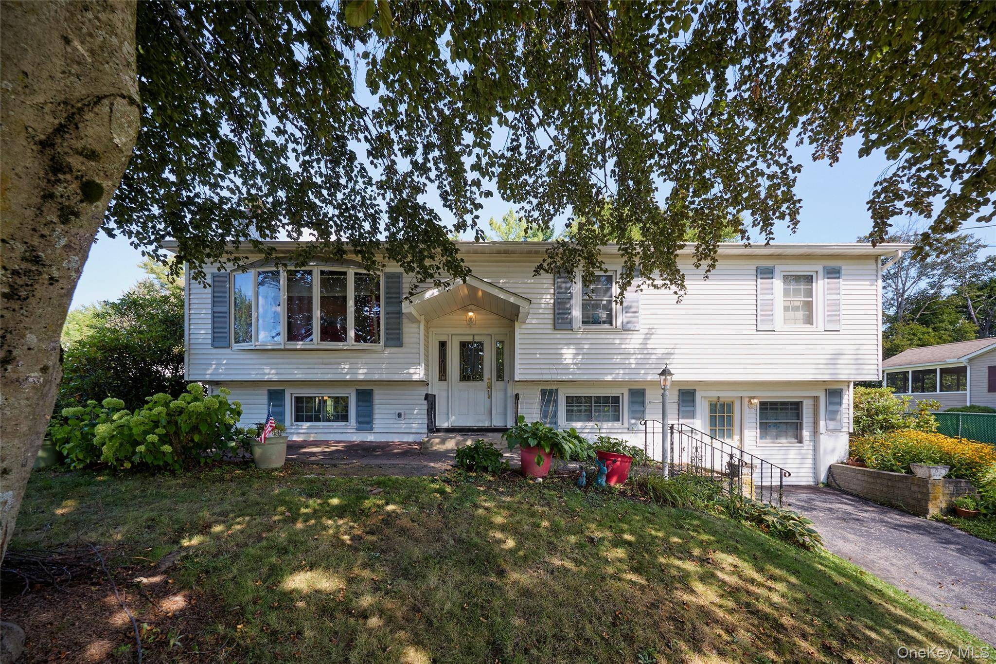 Welcome to this spacious 4 bedroom, 2 bath raised ranch in the sought after Rockingham Farms community of Wappingers.
