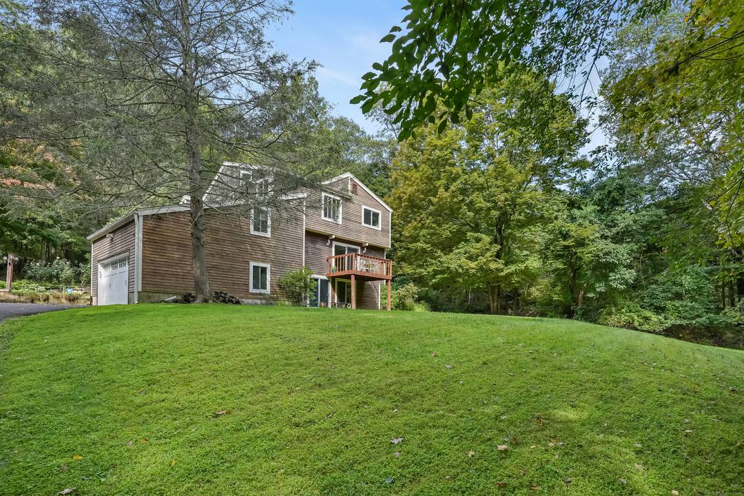 Tucked away on a peaceful cut de sac and boarderd by the serene woodlands of Putnam State Park, this fully renovated contemporary offers a blend of modern luxury and natural ...