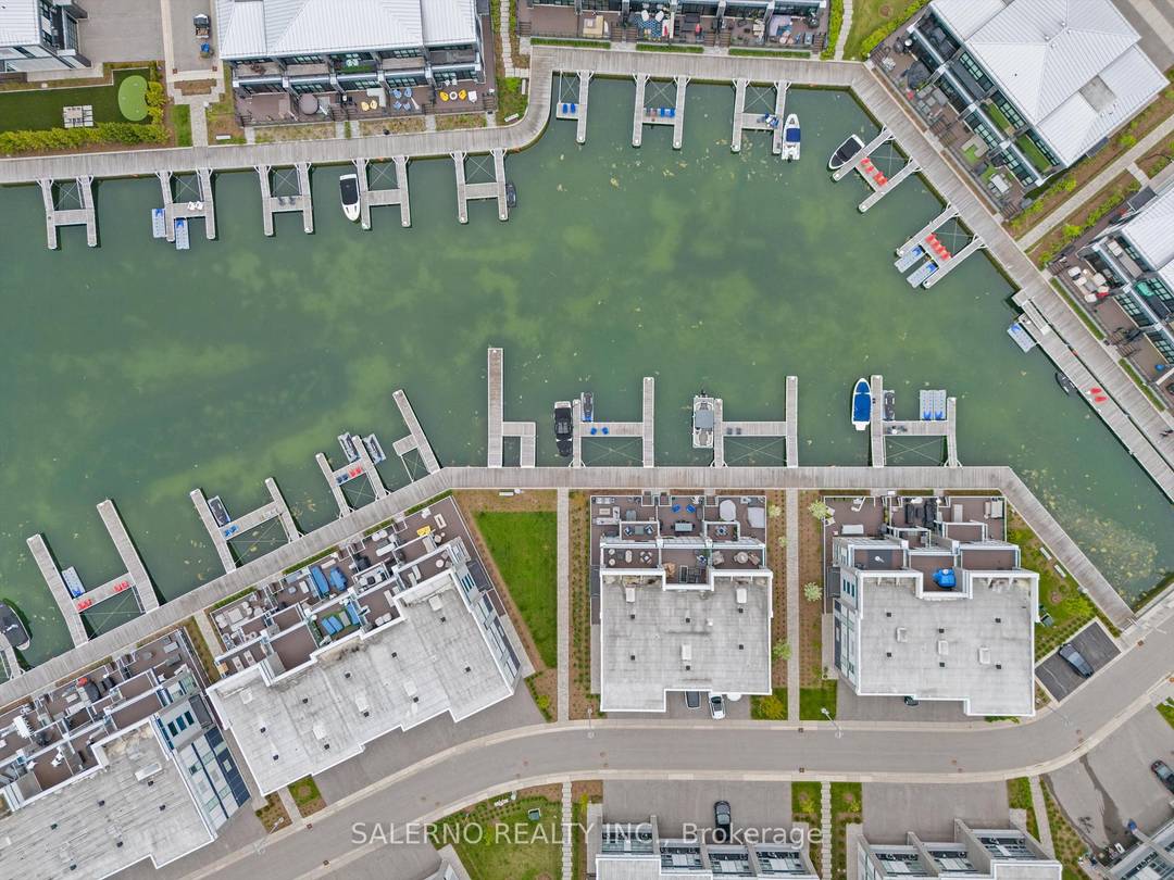 Absolutely Stunning Turn Key End Unit Waterfront Townhome Offering 3, 550 Sq.