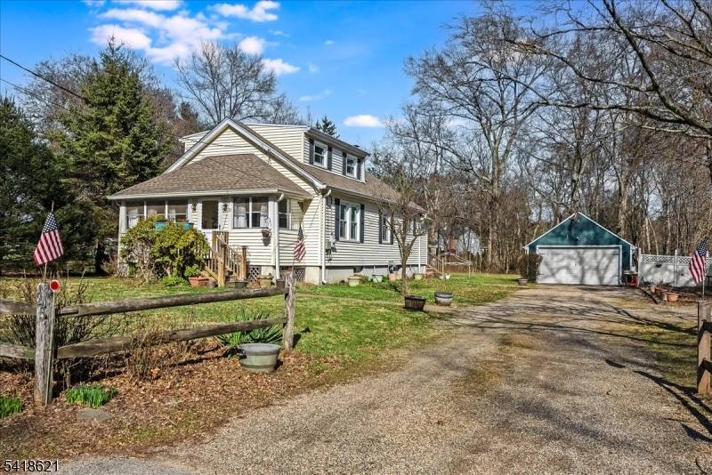 Set on just over half an acre, this charming home offers 3 bedrooms and 1 bath, with an inviting enclosed front porch that adds a relaxed, everyday living space.