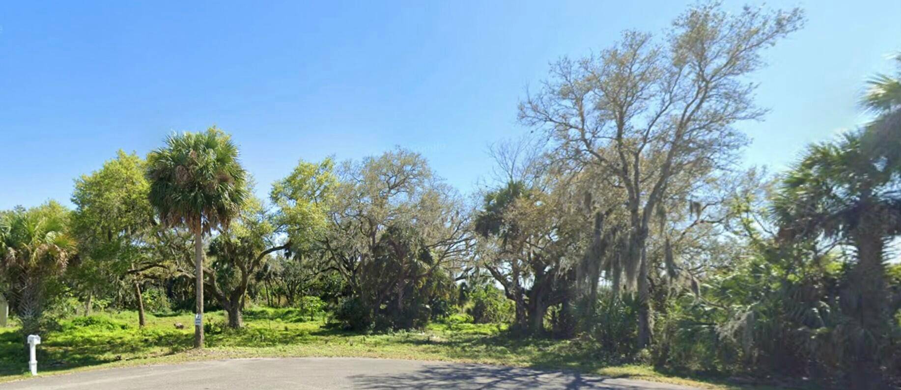 Situated on a peaceful cul de sac along a paved road, this expansive 1.