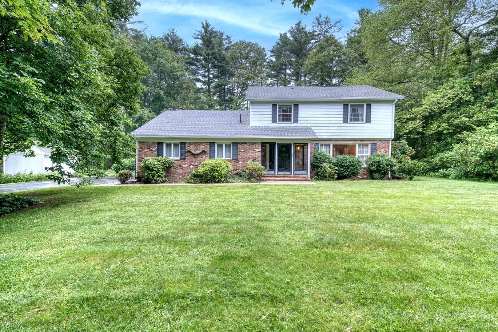 Welcome to 126 Grandview Terrace a stately Colonial with classic brick exterior, nestled on nearly an acre in beautiful, rural Brooklyn !