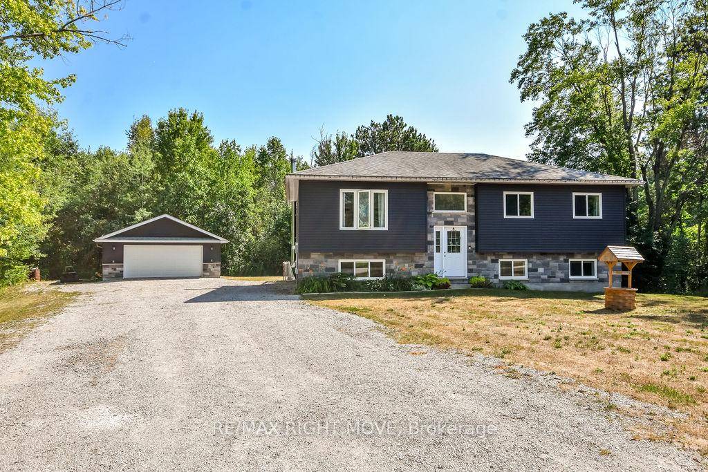 Discover this charming raised bungalow built in 2016, perfectly set on a private 1.
