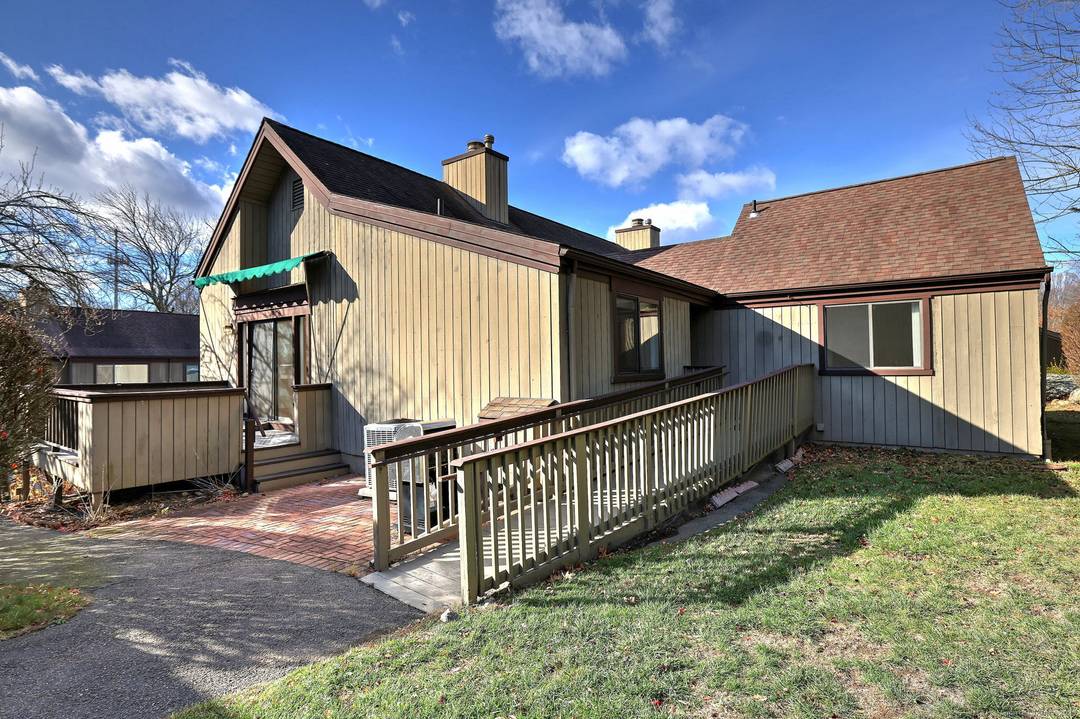 Highly sought after Thoreau model in Oronoque Village, ideally located for privacy and convenience.