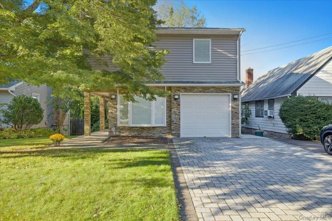 Welcome to 54 Fairfield Avenue a charming 3 bedroom, 2 bath split level home located in the highly desirable Terrace section of Port Washington.