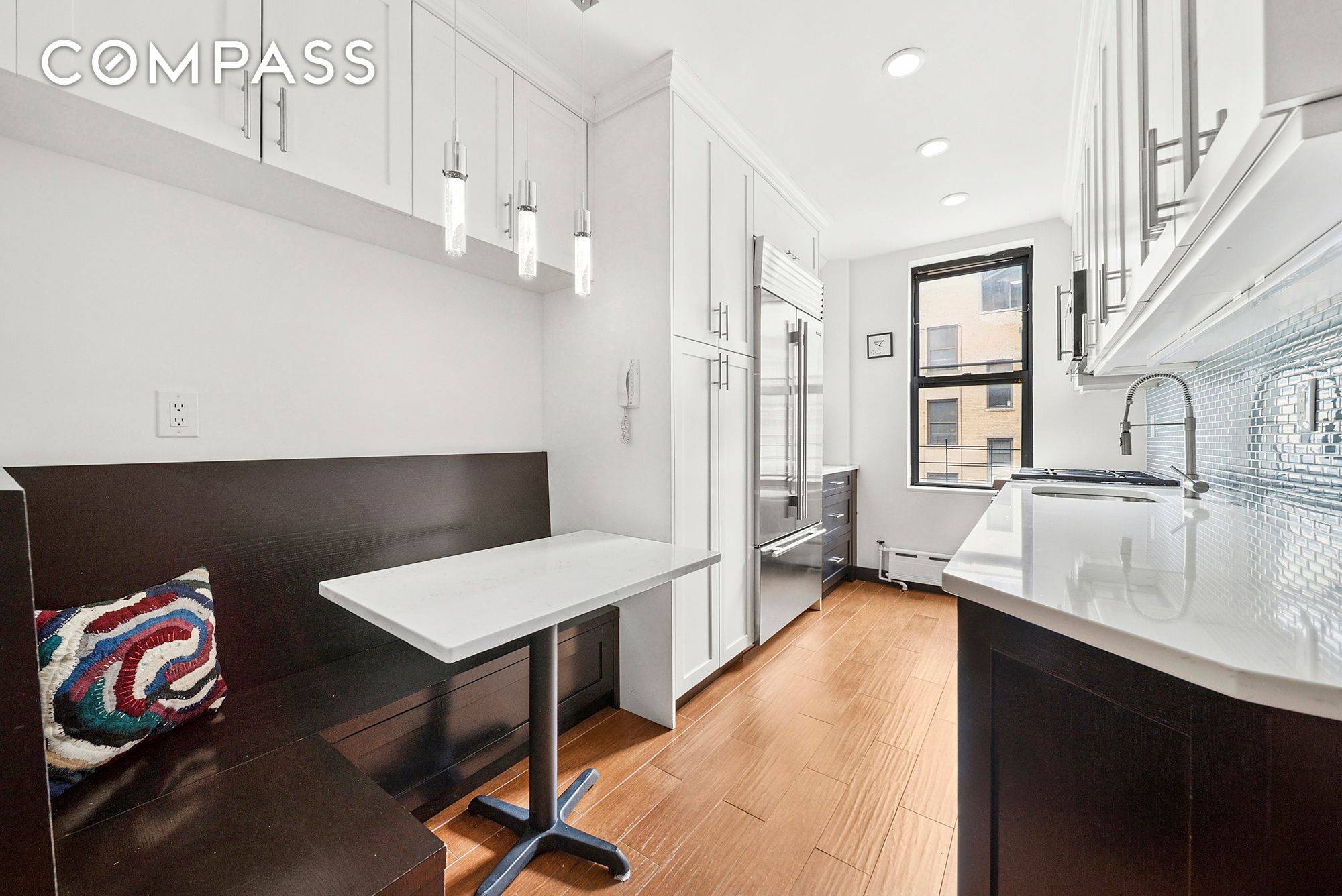 This beautifully renovated classic five room home checks every box with a few delightful surprises.
