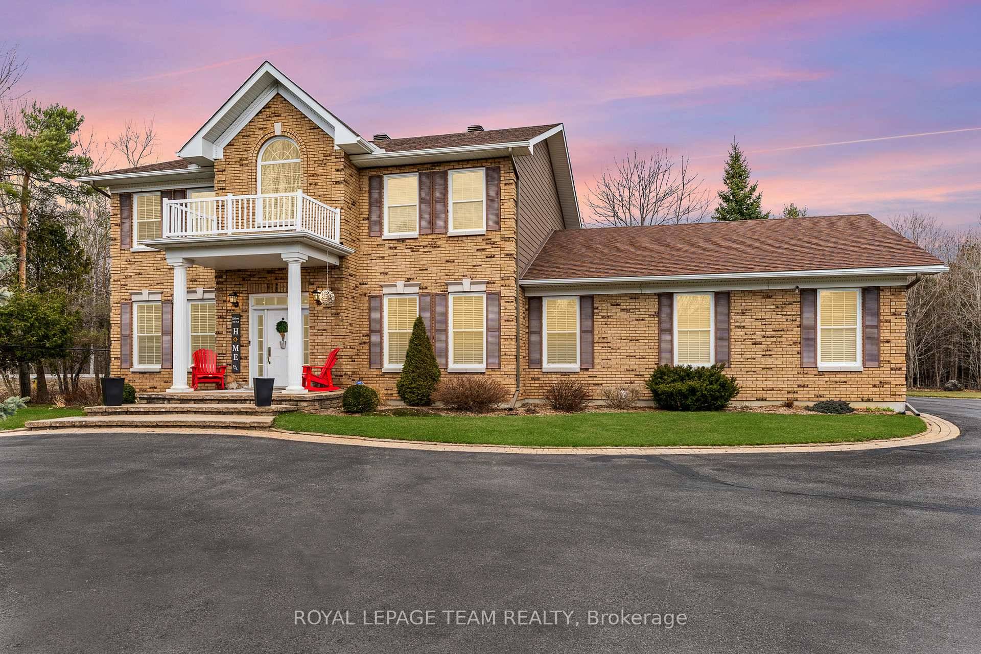 Welcome to 1013 Sale Barn Road in Greely where elegance and space come together in perfect harmony.