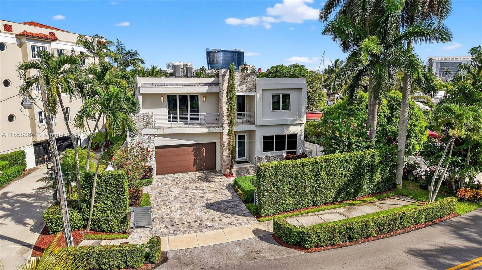 This stunning two story waterfront home combines elegance and tranquility features 4 bedrooms and 5 1 2 bathrooms, open den office or library with balcony.
