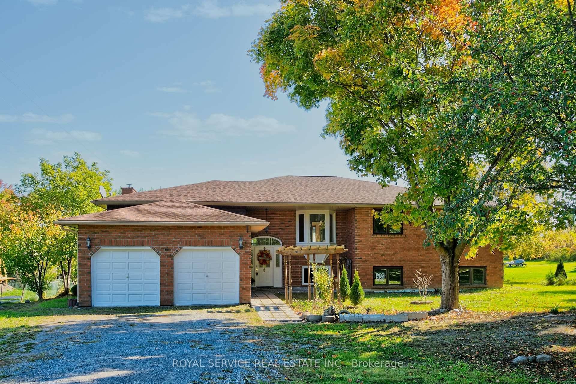 Welcome to 201 IXL Rd, Campbellford a spacious 4 bedroom, 4 bathroom home built in 1991, offering just under 5, 000 sq.