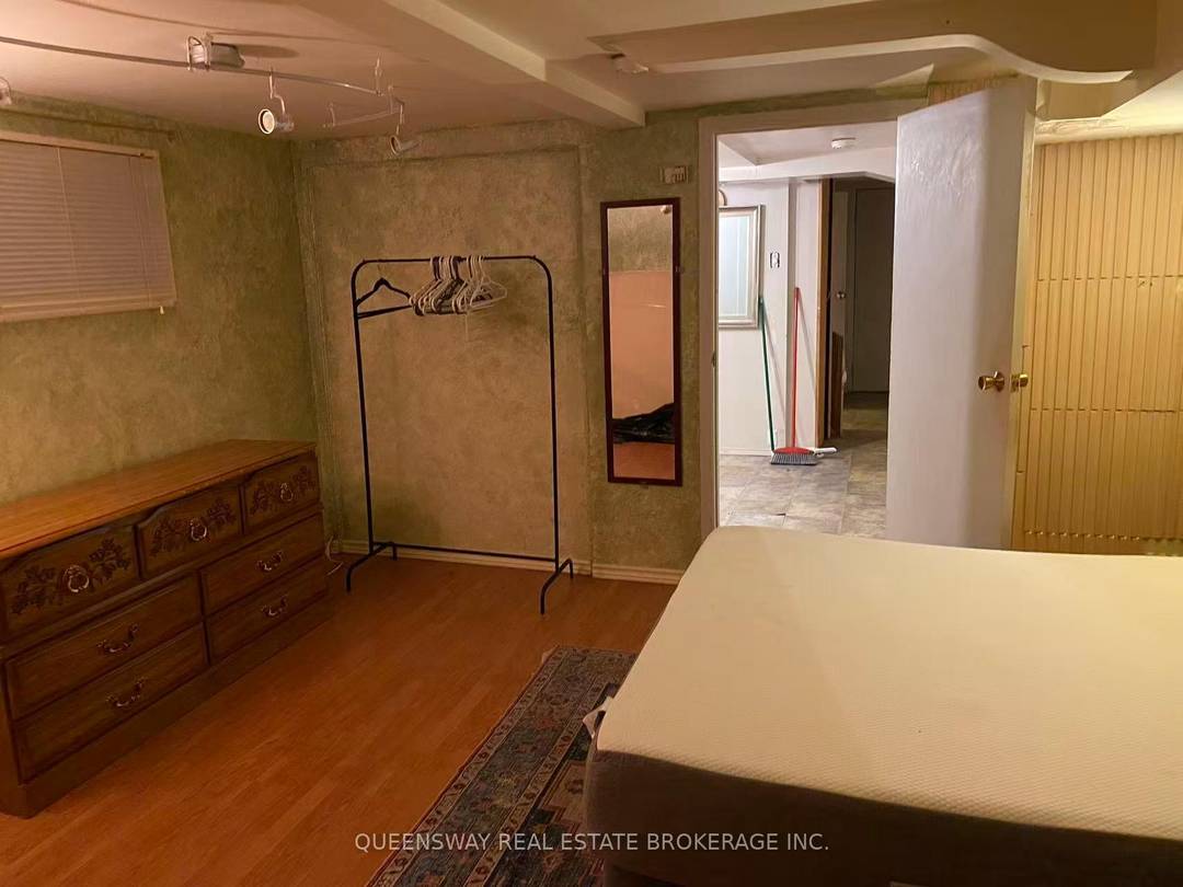 Bright 1 Bedroom Den Basement Apartment Utilities Included.