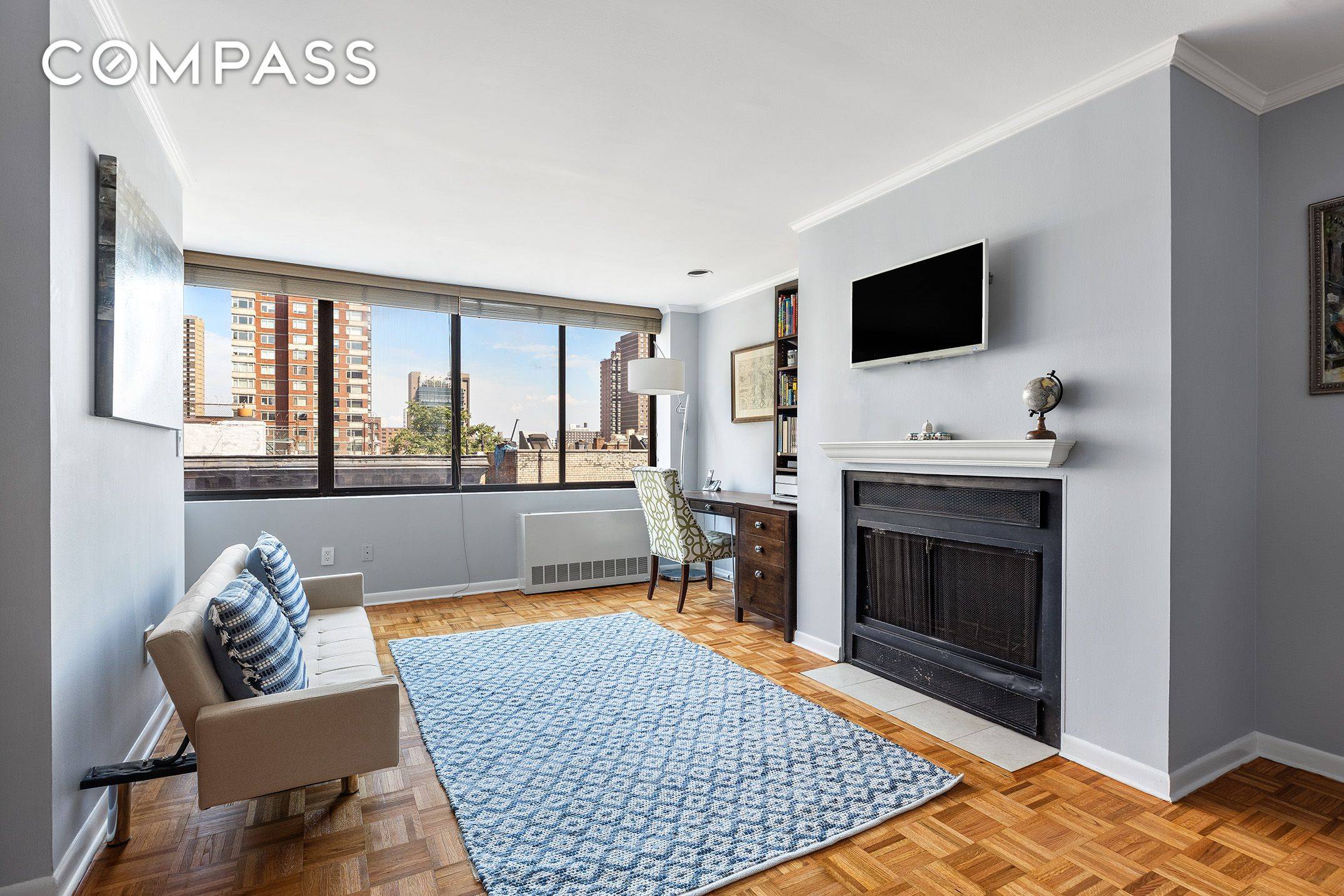 Sunny, quiet and spacious 1BR home office duplex condo with a wood burning fireplace.