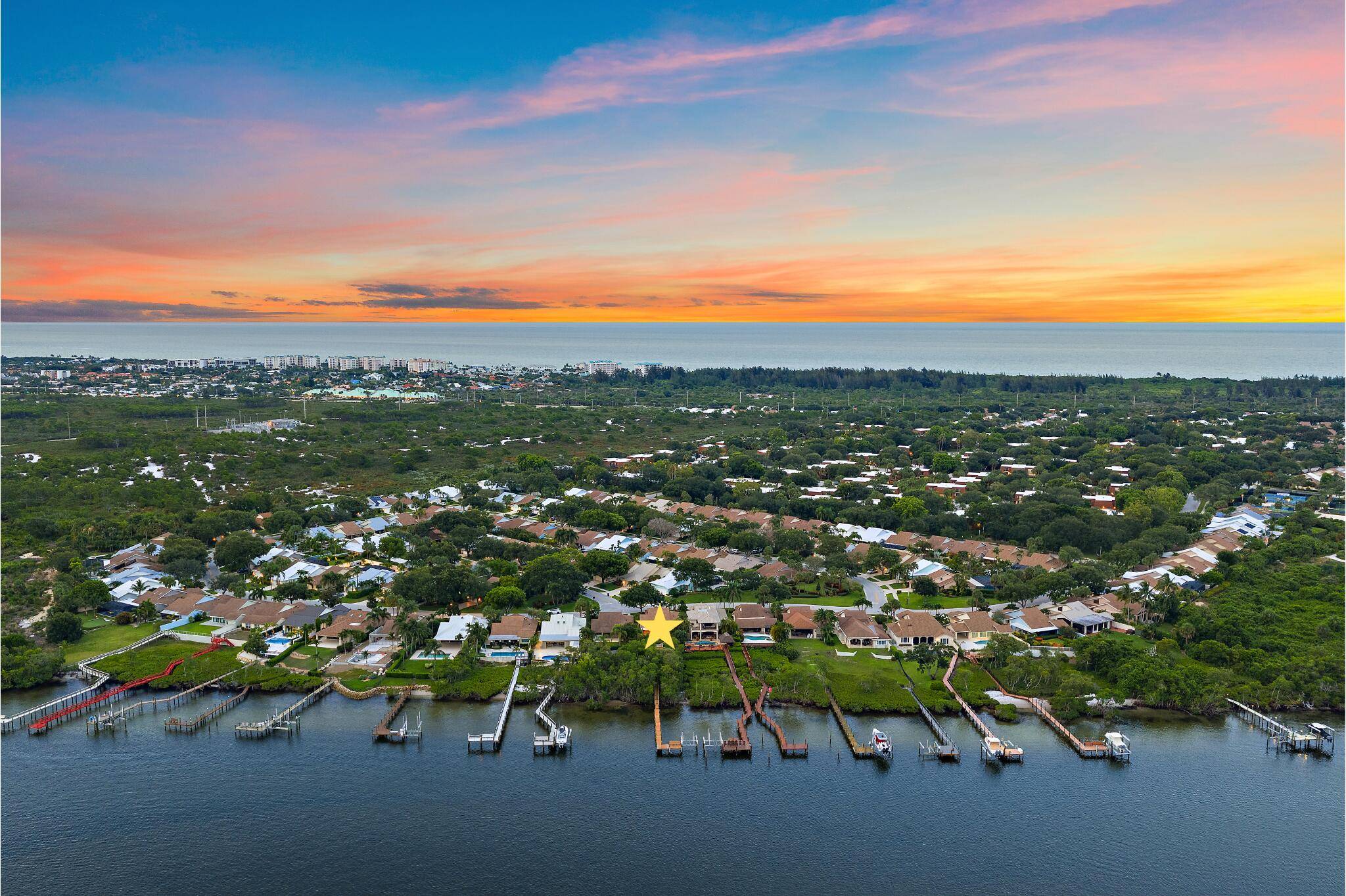 Deep water, Direct Intracoastal front home with private dock and endless potential in the River Bluffs community of Jupiter !