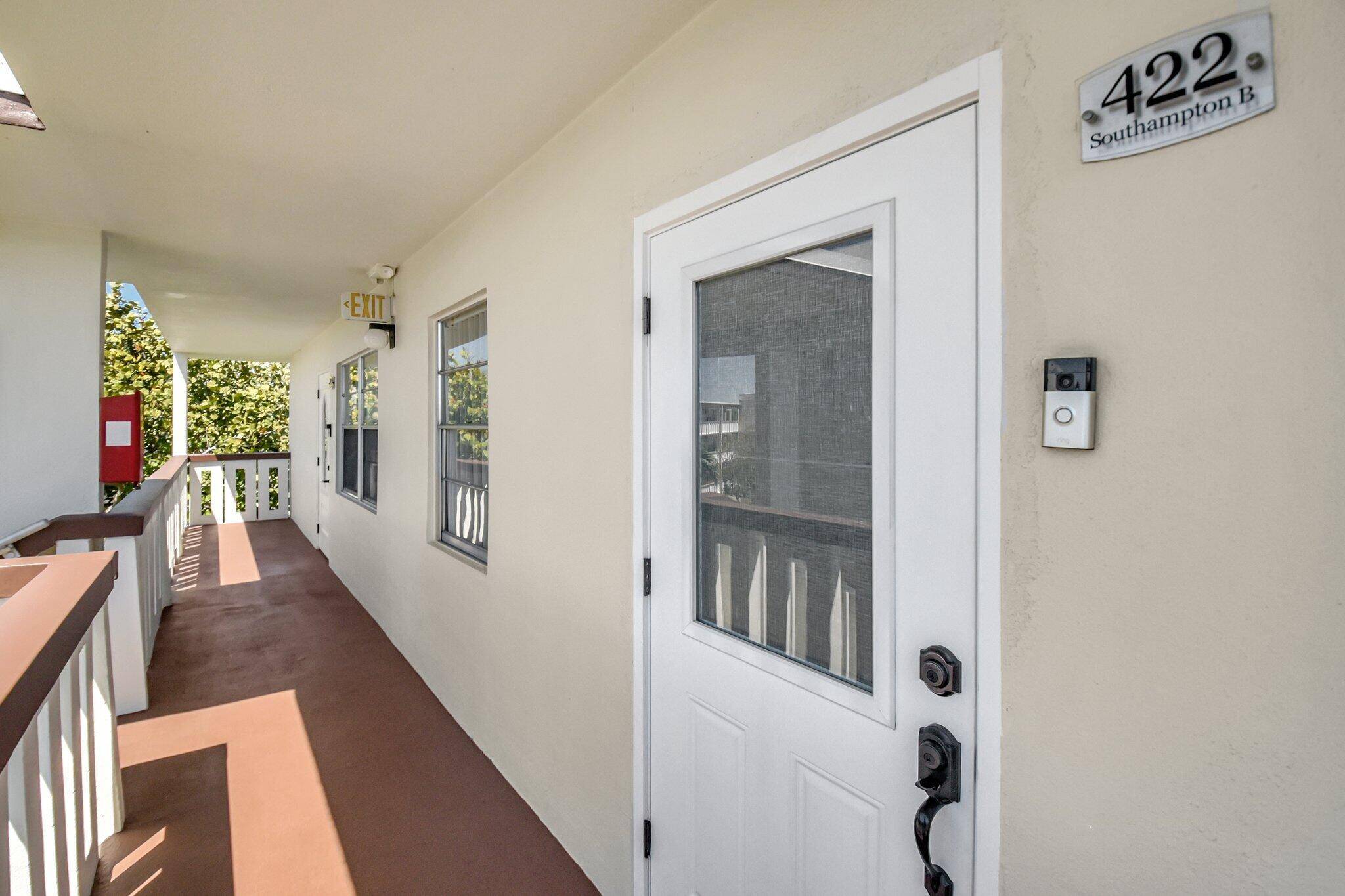 Beautiful penthouse unit with 2024 ROOF and 2022 A C plus solid maple kitchen cabinets, granite counter tops, under counter lighting, tiled back splash, tiled flooring, curb less shower, and ...