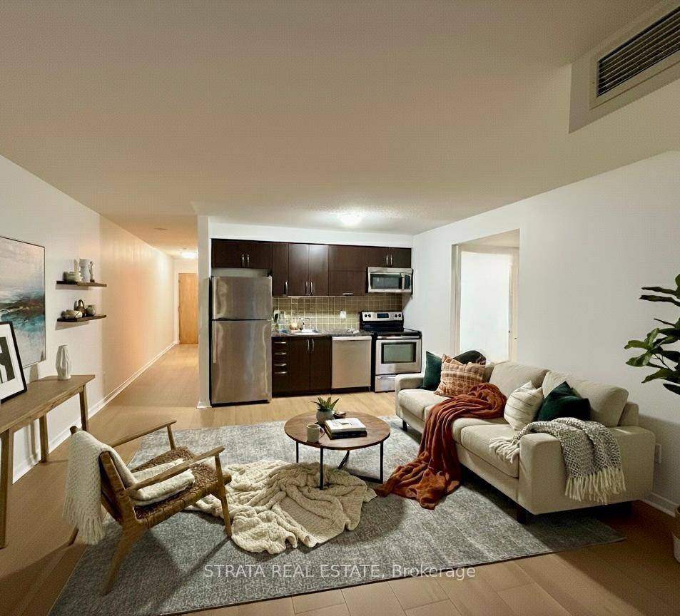 Freshly painted with newly installed laminate floors, this stylish 2 bedroom, 1 bath suite offers open concept living with a modern kitchen featuring stainless steel appliances and granite countertops.