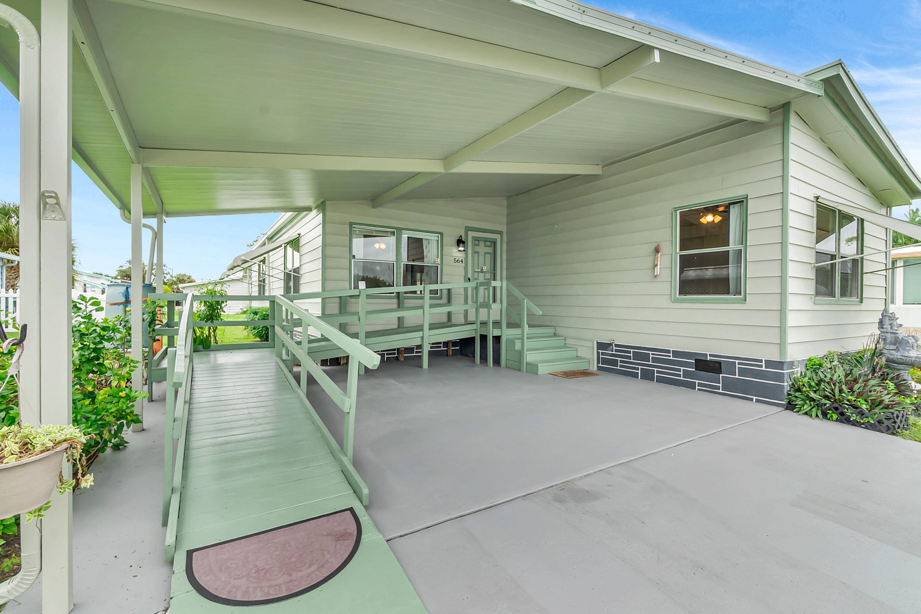 Discover comfort, convenience, and community in this charming 2 bedroom, 2 bath handicap accessible residence, in the heart of the sought after, quiet 55 neighborhood of Hollywood Estates.