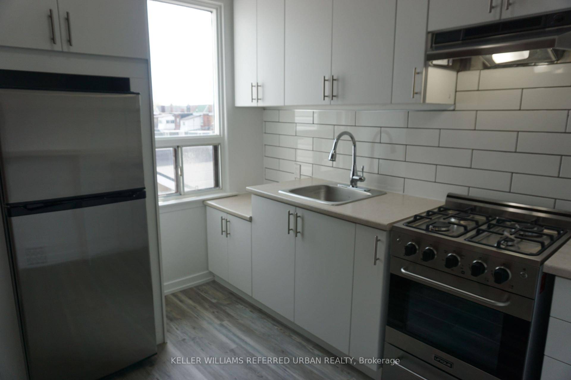 Stunning 2 Level Apartment with Character amp ; Convenience !