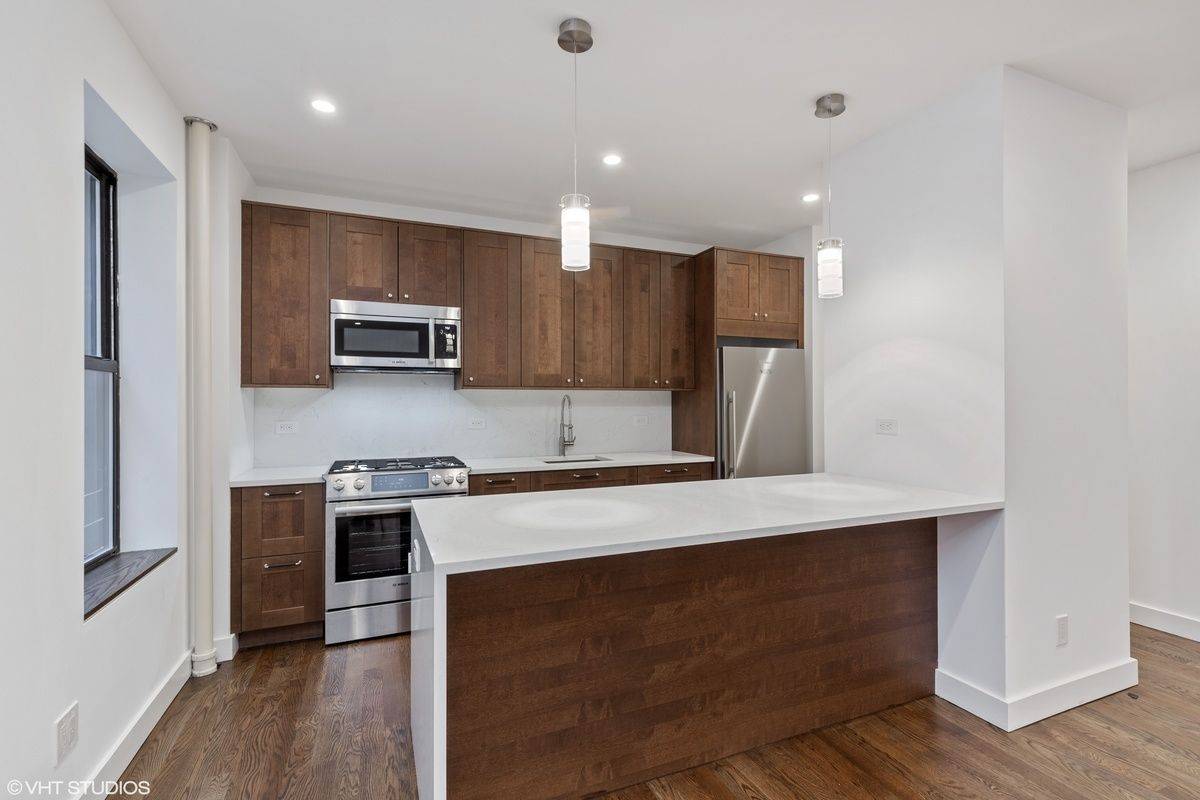 New meets old in this totally gut renovated 3BR unit.