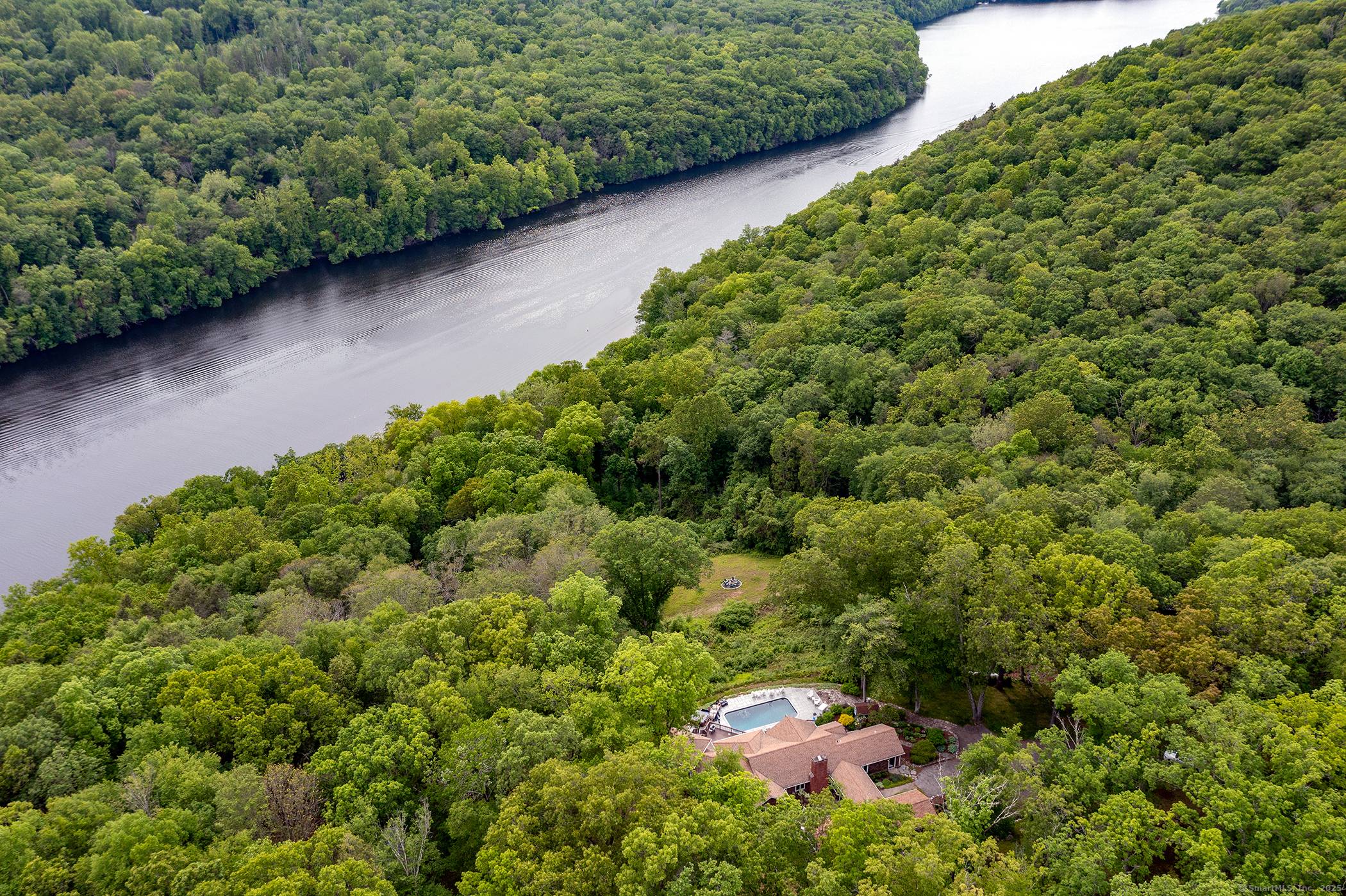 Discreet Gates Lead to Totally Private 30 Acre Waterfront Compound.