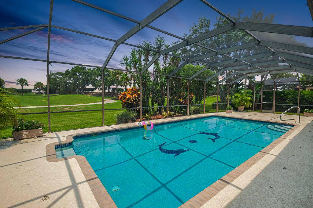 Welcome to this stunning 3 2 2 pool home nestled in sought after Country Club Estates.