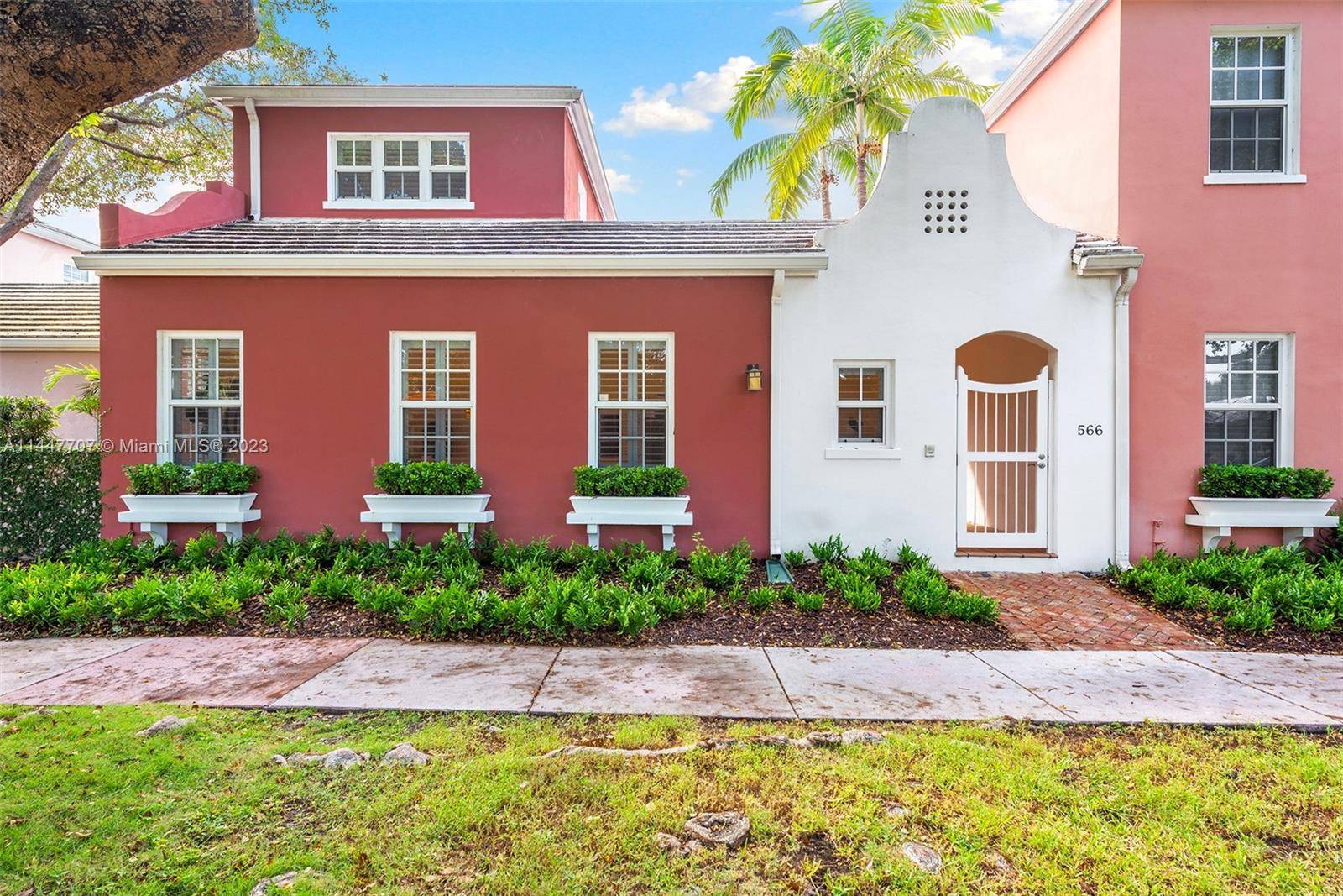 Crafted in the spirit of George Merrick's famous exotically themed Gables neighborhoods this tropical Bermuda style modern townhome delivers serene private courtyard style living on a quiet tree lined street ...