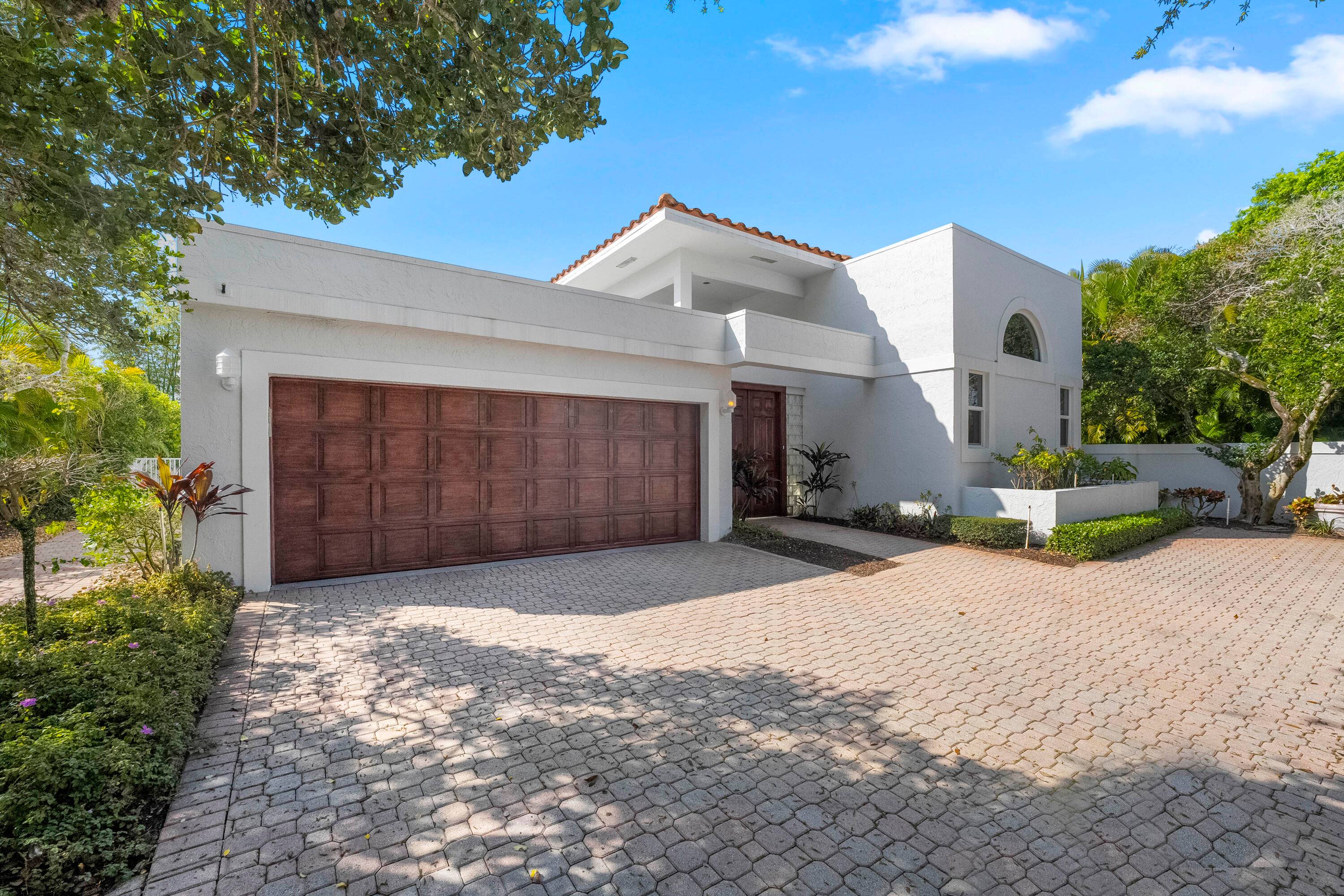 Walk into this Court Yard home, with pool and Guest house.