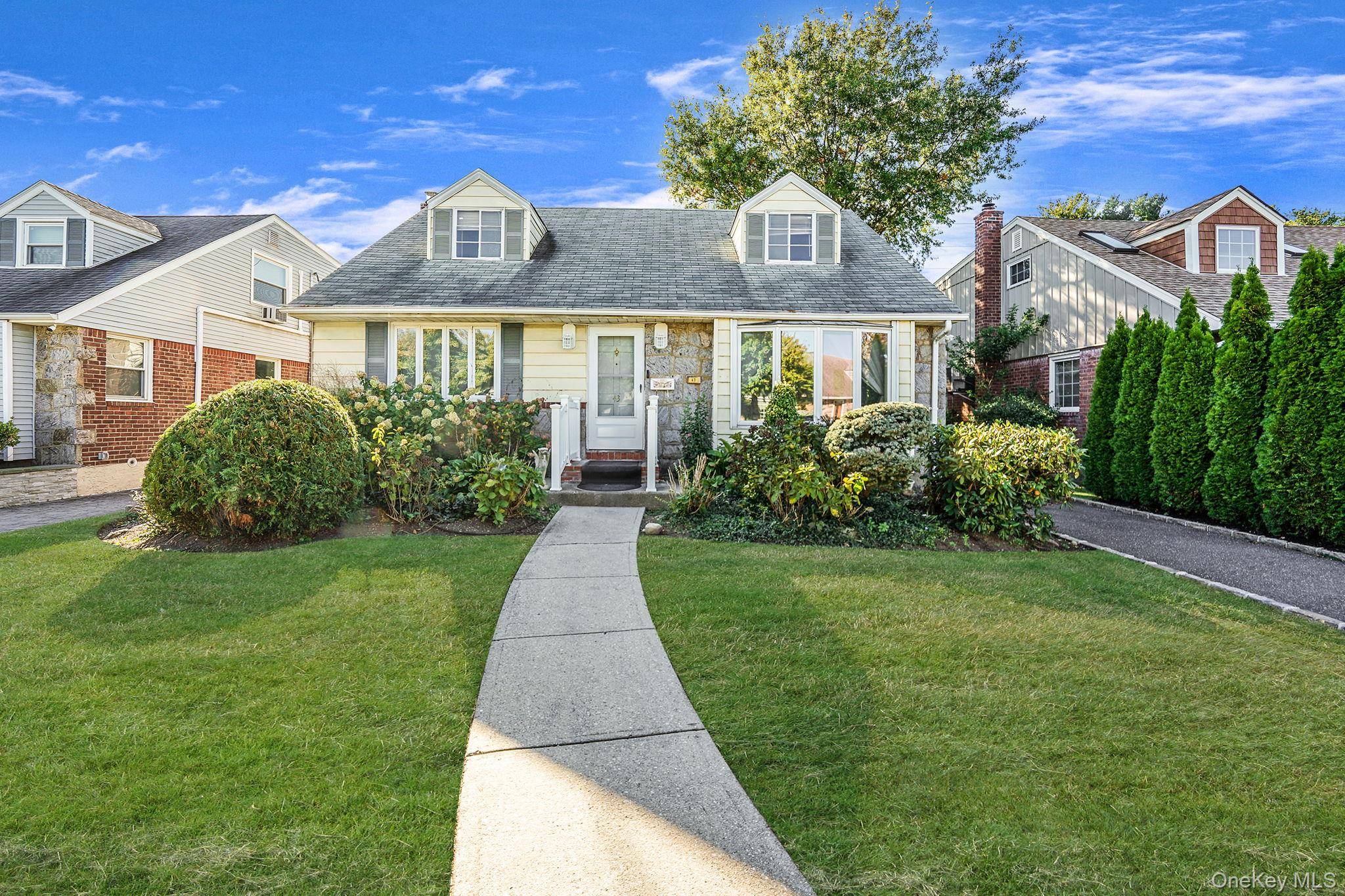 Beautiful Cape Cod Style Home Located in Mineola East Williston School District.