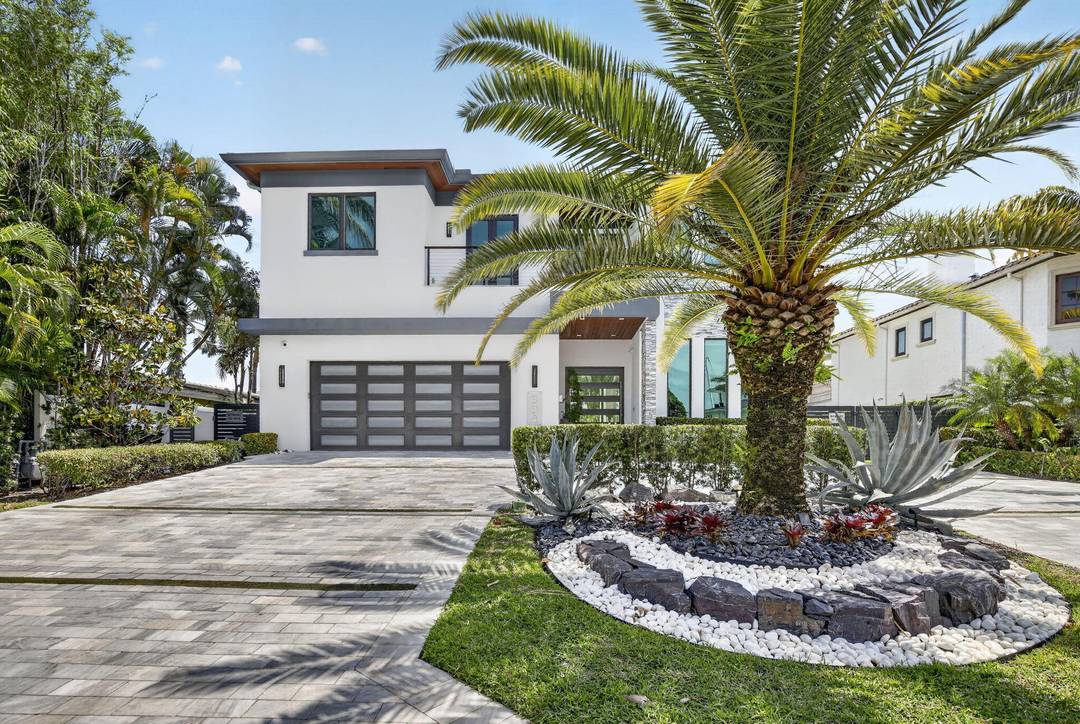 Experience refined waterfront living in this stunning Ocean Access 2021 estate located in the prestigious Las Olas Isles.