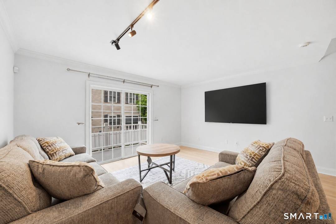 Perfectly positioned on the Stamford Darien border, this sun filled townhouse in The Village at Maple Point offers the ideal blend of space, convenience, and low maintenance living.