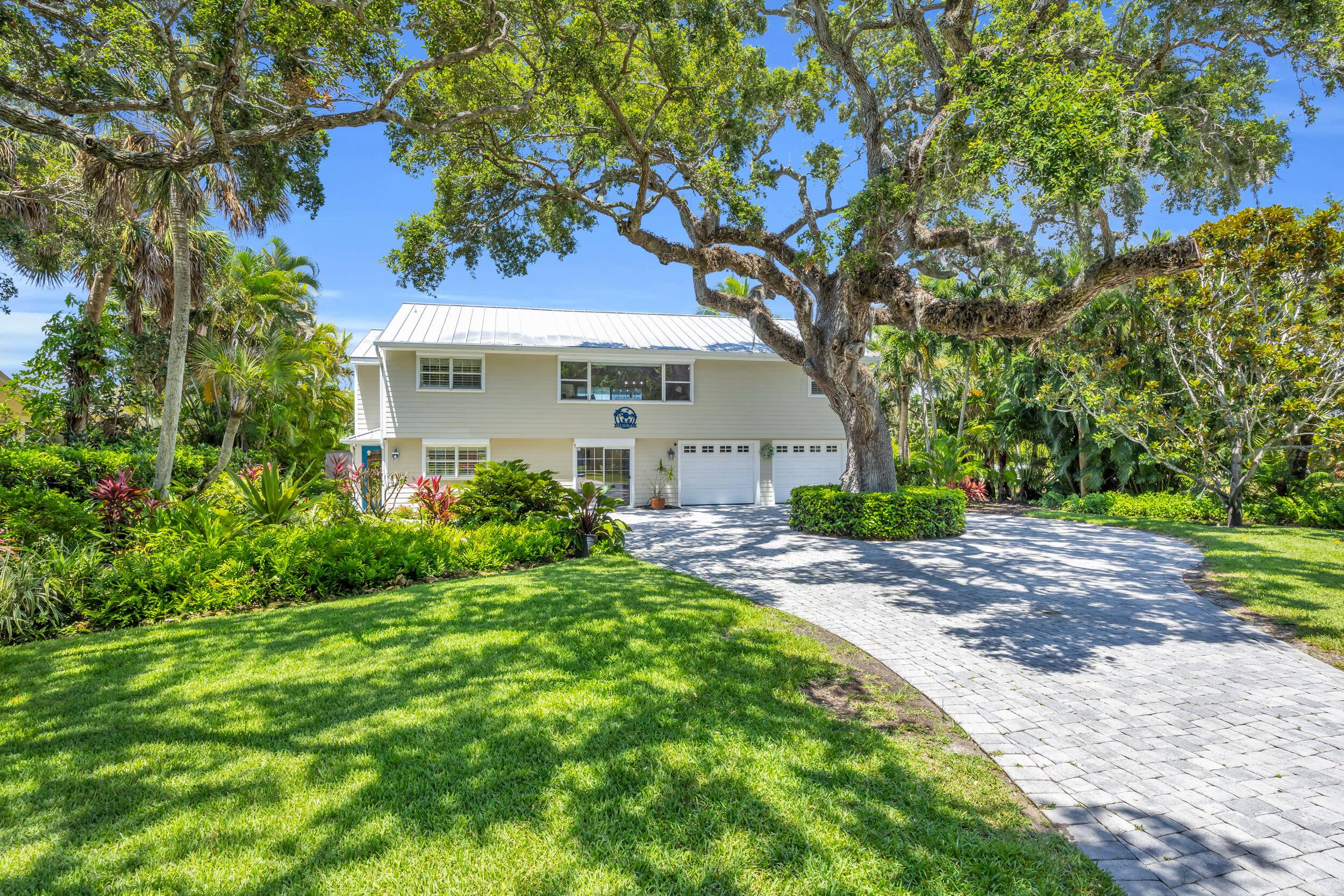 Wake up to daily dolphin manatee sightings from your backyard at this unique riverfront home, complete with a private dock, 12, 000 lb boat lift, and newly refinished seawall !