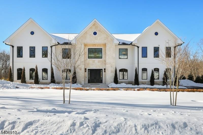 Welcome to this stunning, brand new built 39 Westmount Drive, a rare offering that combines architectural elegance with modern luxury in one of Livingston's Bel Air, most coveted neighborhoods.