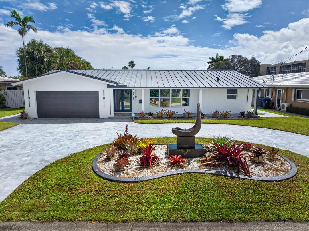 Experience waterfront living in this beautifully updated 4 bedroom home on a quiet canal with direct ocean access and just minutes to the Intracoastal.
