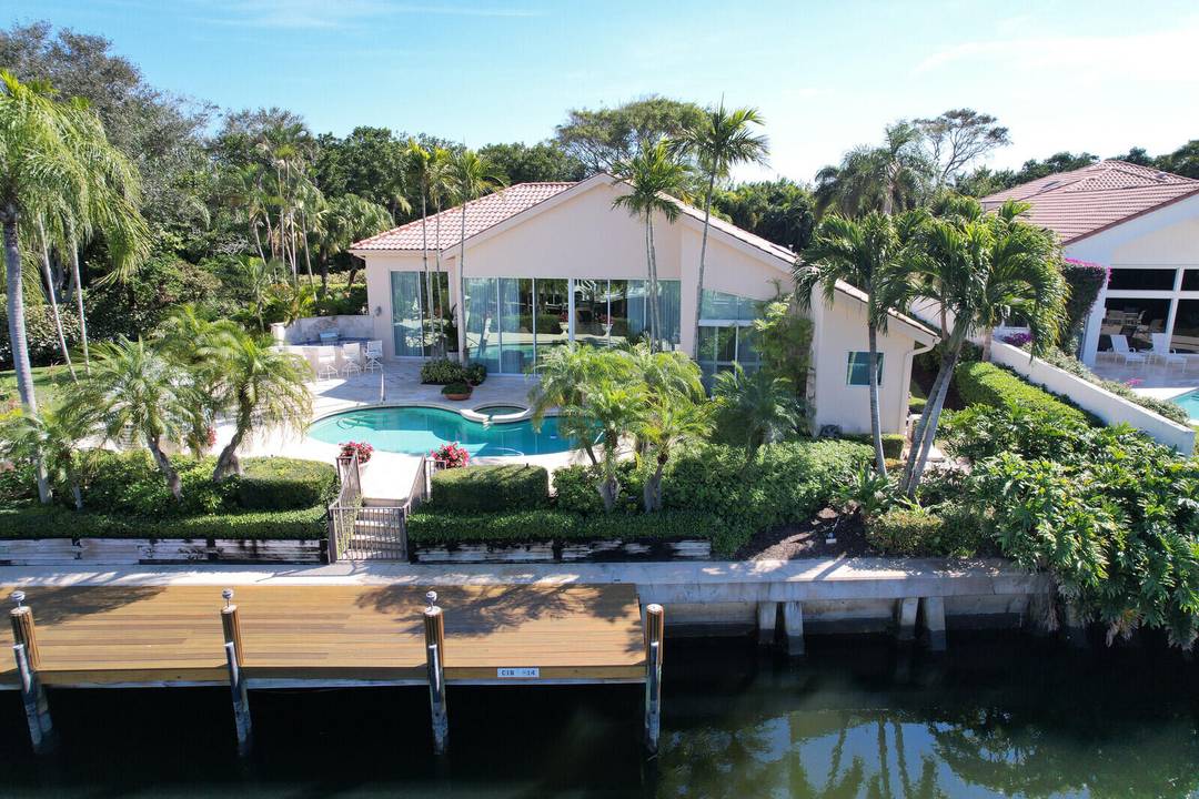 Rare, rare, rare Frenchman's Creek home for luxury resort living, including golf, beach, and boating.