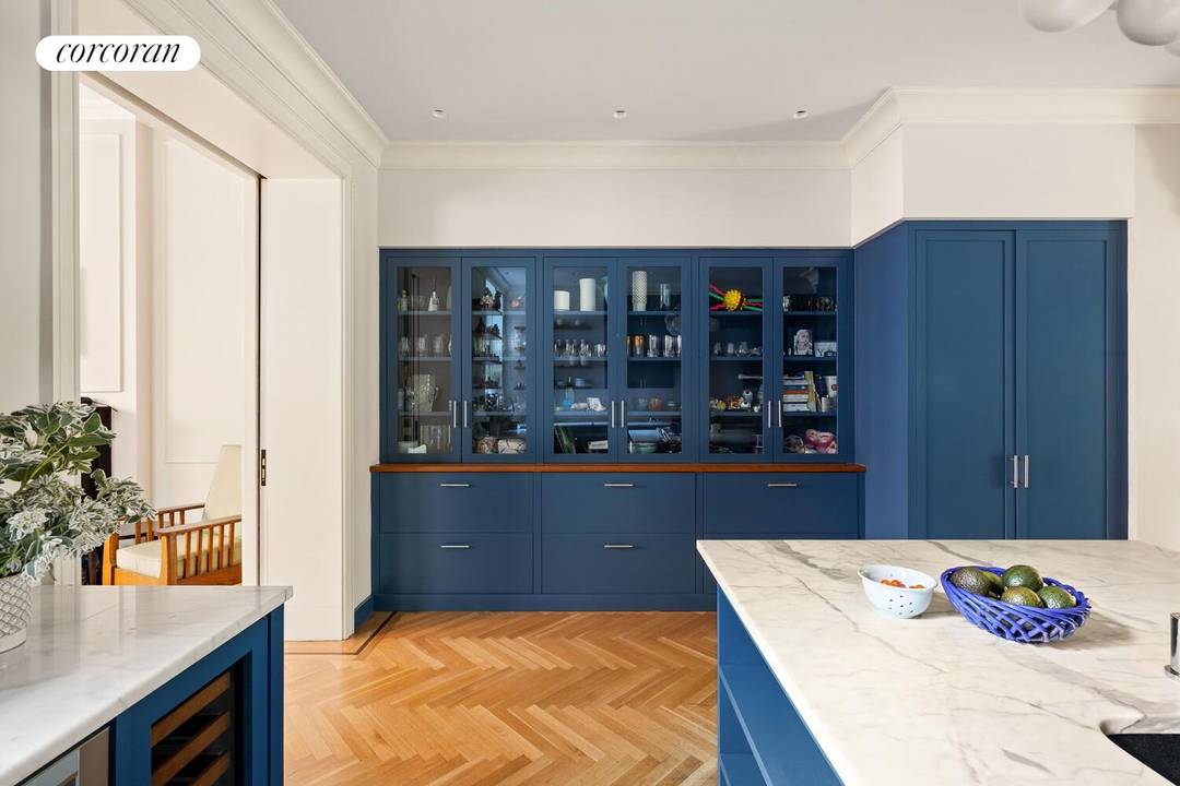 Welcome to one of the neighborhood's most distinguished residences, 291 Clinton Avenue, a 5119 SF Romanesque Revival townhouse, masterfully reimagined for modern living.