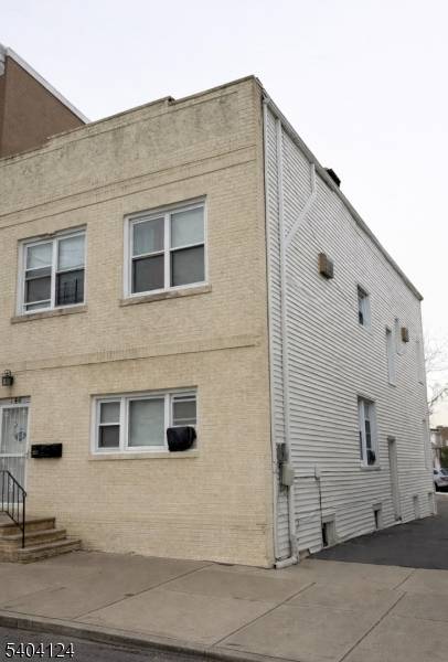 Well located, Legal three family offering strong upside potential.