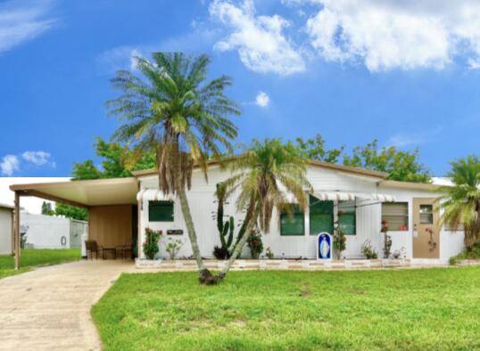 1984 40 x 24 Dble wide manufactured home w carport is cute, cozy ready for you !