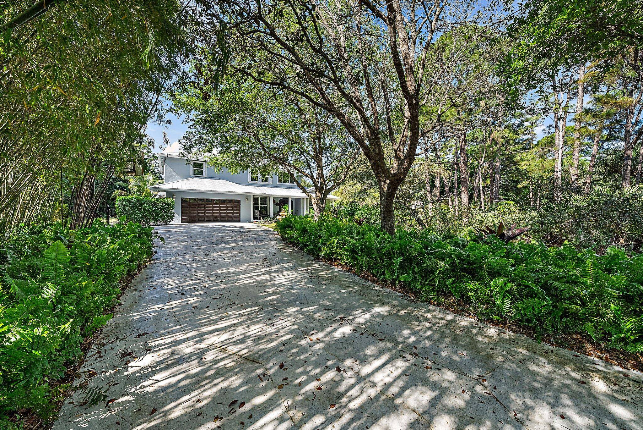 Discover a secluded paradise with tropical charm in the heart of Jupiter.