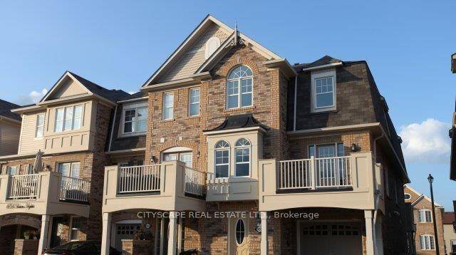 Freshly painted 3 bedroom end unit townhome bright, modern, and move in ready !