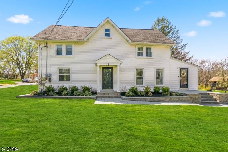 A rare and versatile opportunity in highly sought after Randolph, this side by side, two family home offers flexibility, privacy, and long term value on an expansive 1.