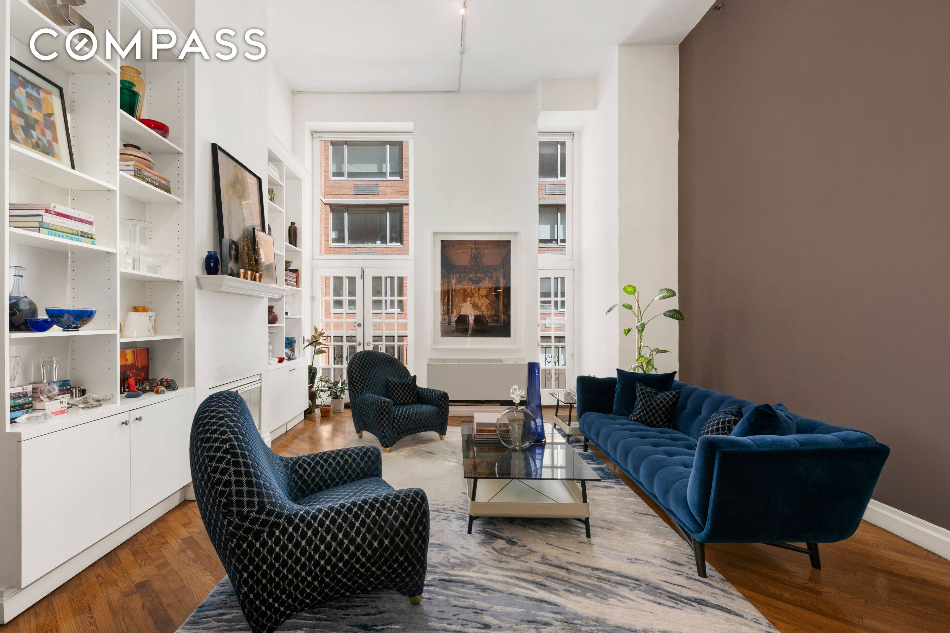Welcome to Residence 2D at 121 West 20th Street an expansive and elegant two bedroom, two bathroom duplex loft condo nestled in the heart of Chelsea.