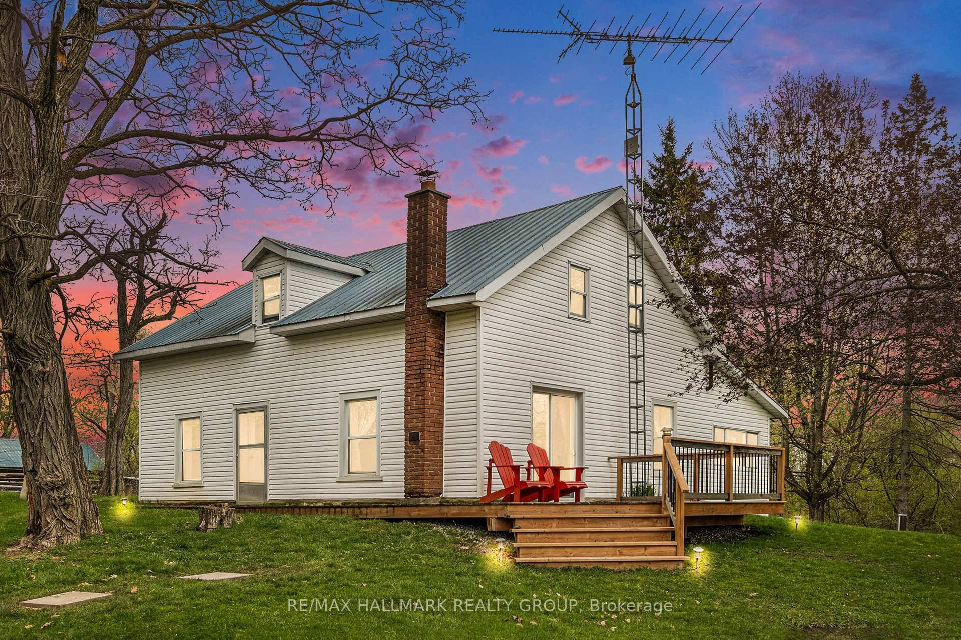Big Rideau Lake homestead with 370 feet of crystal clear waterfront.